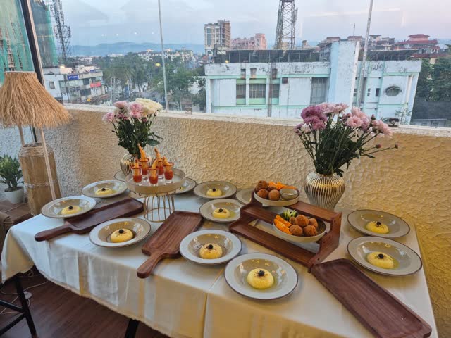 A table set for a party on the terrace